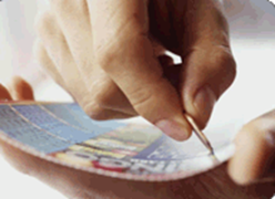 Les origines des cartes de grattage